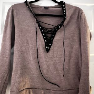 Tan and black long sleeves lace up shirt